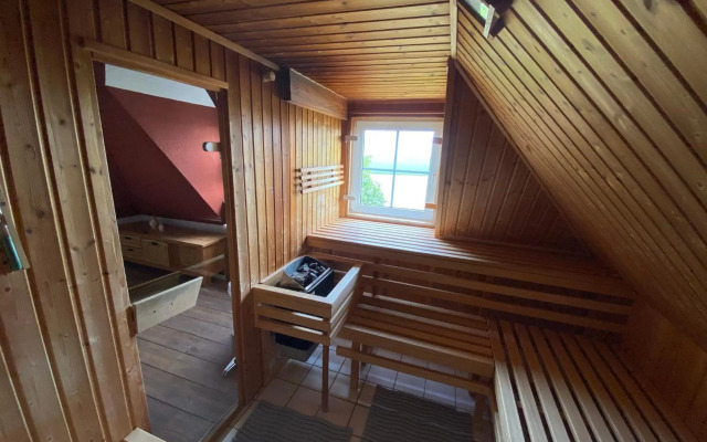 Ferienwohnung im Poolhaus mit Ostseeblick