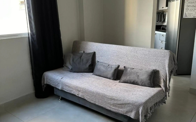 Apartamento novo ao lado do Rio Centro!