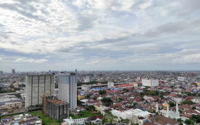 Vibrant 2BR at Vida View Makassar Apartment