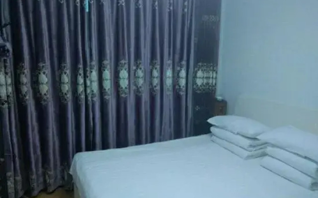 Benxi Huamu Hefu Warm Apartment