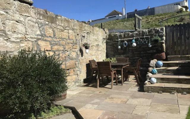 Petfriendly-beachfront-sunsetfacingsunporch-garden