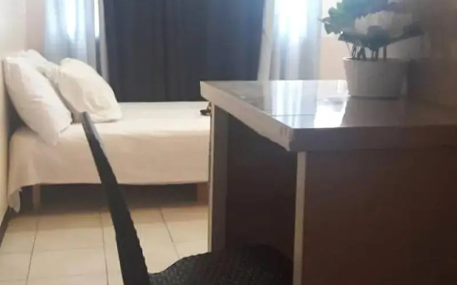 Ekonumi Rooms at Benrosi Plaza
