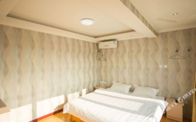 Kelinning Hotel Qingdao Lingshanwei
