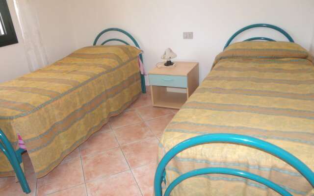 San Teodoro L'Alzoni Apartments