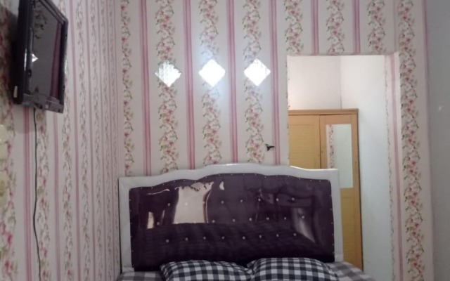 OYO 93192 Andesta Guest House SyariahNearAgrowisata Sungai Pinang Agro Nadin