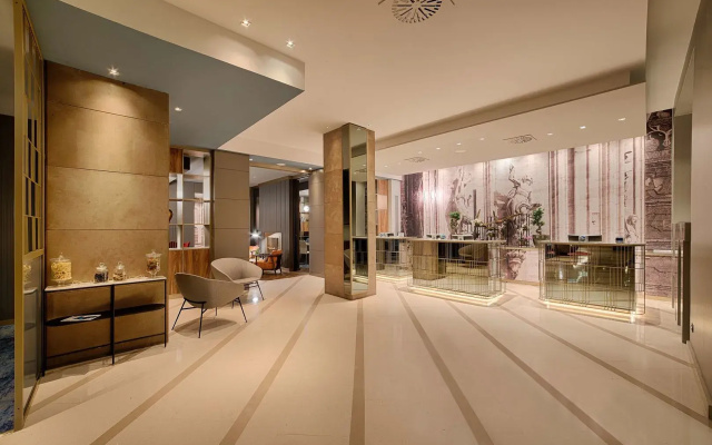 Отель NH Collection Milano Touring