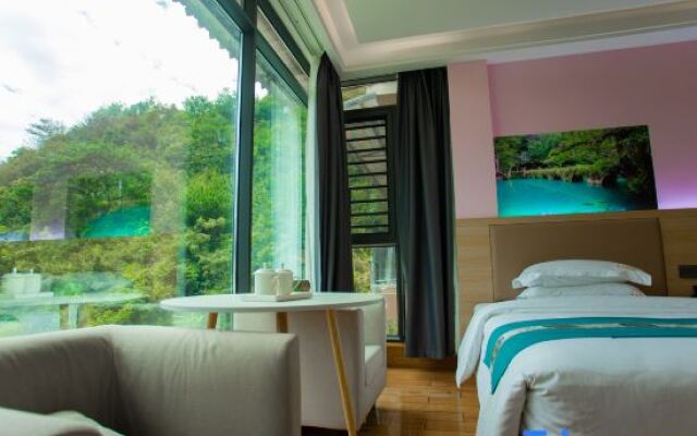 Libo Xiaoqikong Xinjiayuan Inn