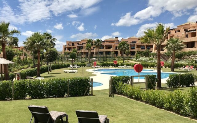 Casares Beach Golf Apartment With Private Garden and Pool Access