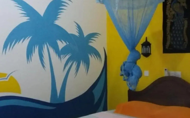 Malika's Yellow House