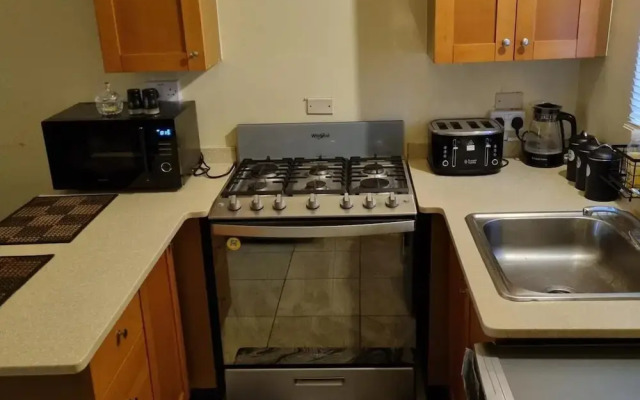 Charming 2-bed House in Portmore Gated Community