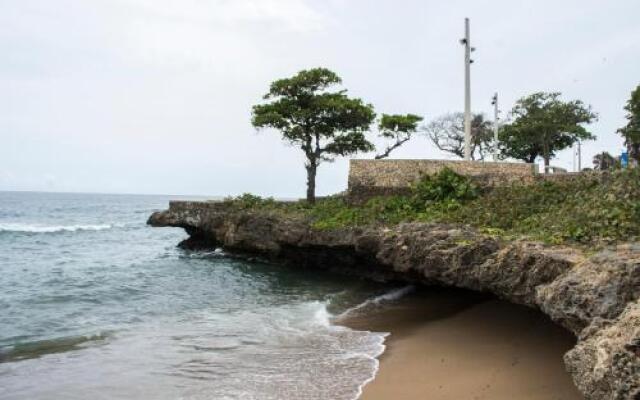 Malecon Rooms y Hotel