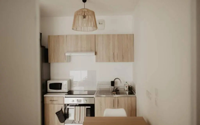 Bel appartement climatisé avec place de parking