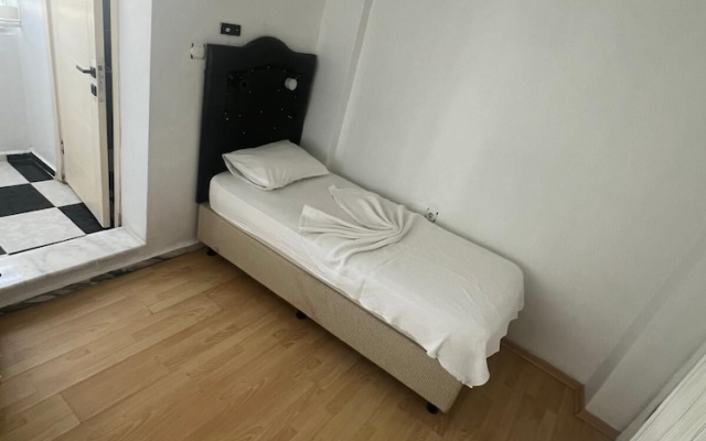 Merkez Pansiyon Sarımsaklı