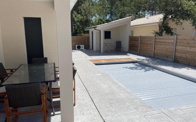 Villa Lacanau avec piscine chauffée