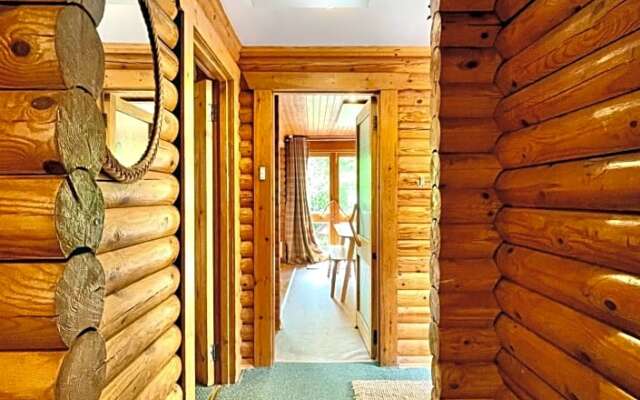 Riverside log cabins