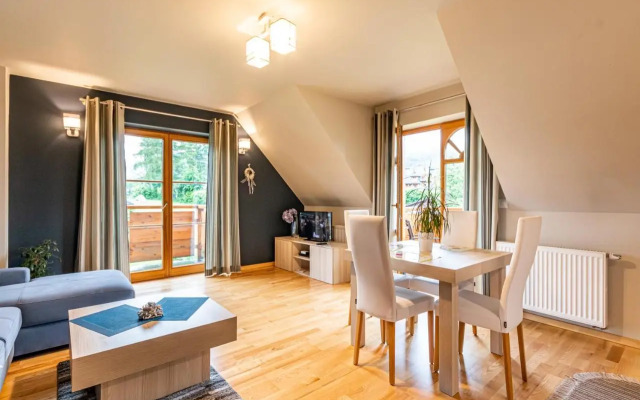 Domek za Strugiem - pokoje i apartamenty