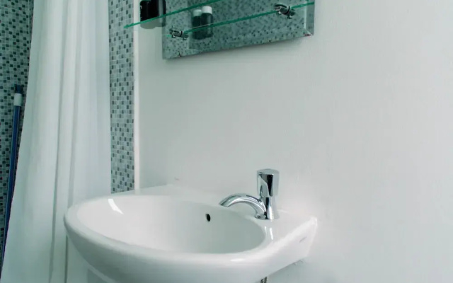 Nice Studio Apartment at Aeropolis Residence Near Cgk Airport