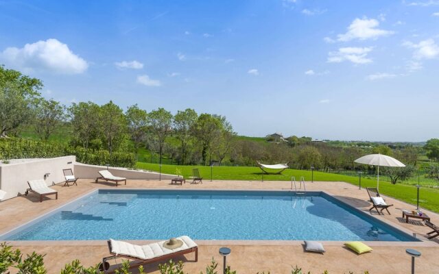 Inviting Holiday Home in San Costanzo With Swimming Pool