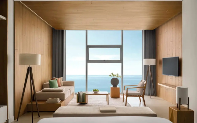 Signature By M Village Beachfront Hotel