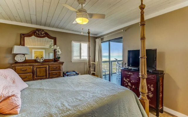 Newly Remodeled Oceanfront Condo with Salt Water Pool and Private Walkway to Beach by RedAwning