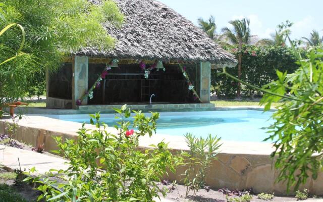 Coast Sun Gardens Cottage