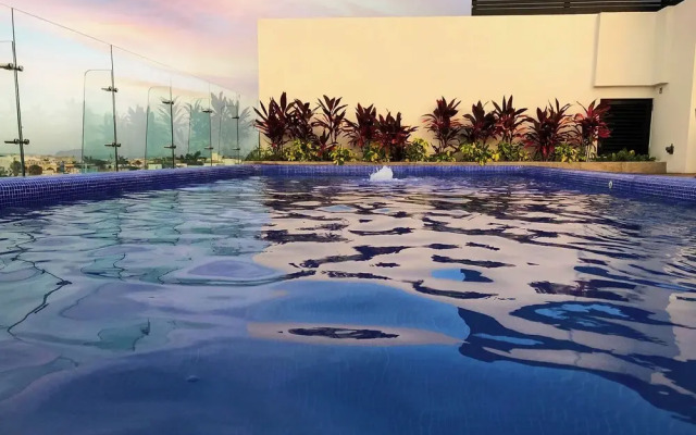 Luxe Condos Complex with Roof Pool