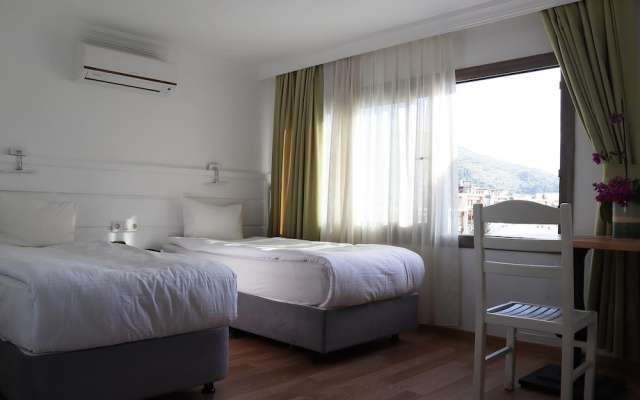 Dort Mevsim Pansiyon