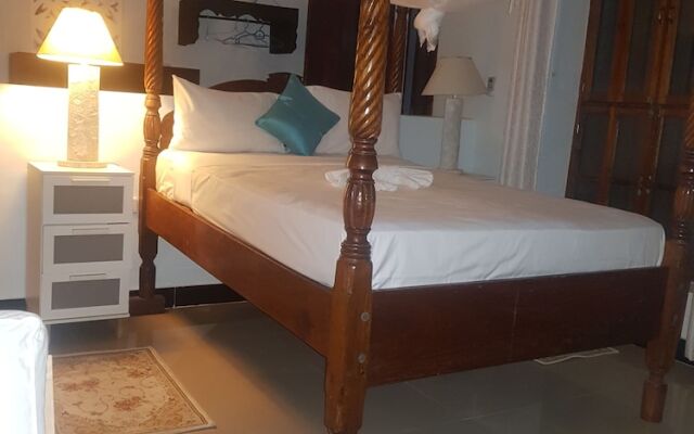 "room in Guest Room - Romantic Room With Access to Beach Ideal for 2 Guests, in Kigomani, Zanzibar"