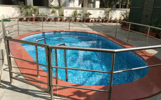 Click White House Residency Vadodara