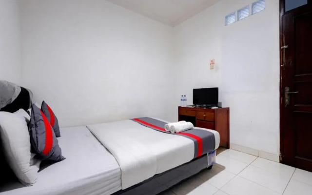 Super OYO 91535 J&b Rooms Tomang