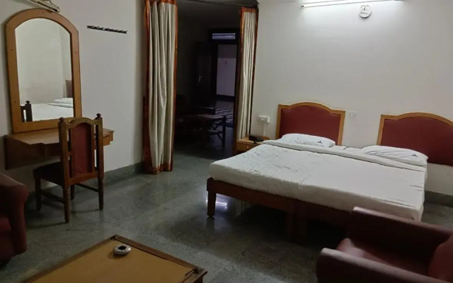 Spot On 808263 Hotel Karunadu Mysore