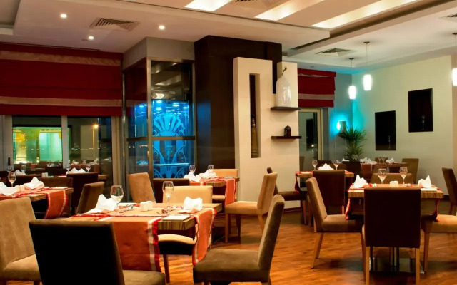 Magnum Hotel & Suites West Bay