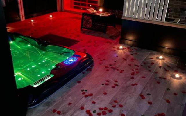 La suite Grenoble spa jacuzzi et sauna privatif
