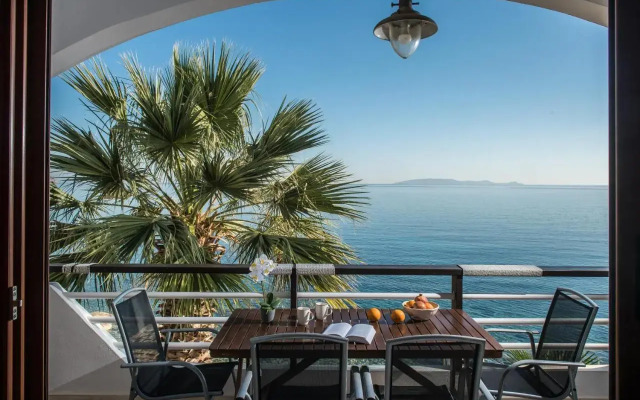 Exclusive Seaside Retreat with Shared Pool & Private Beach Access