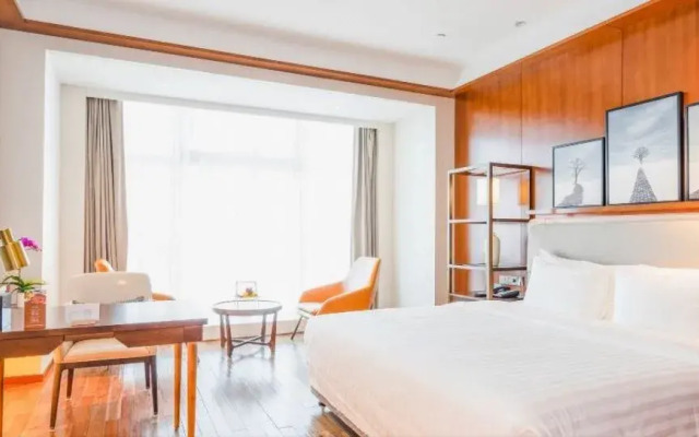 Maison New Century Hotel