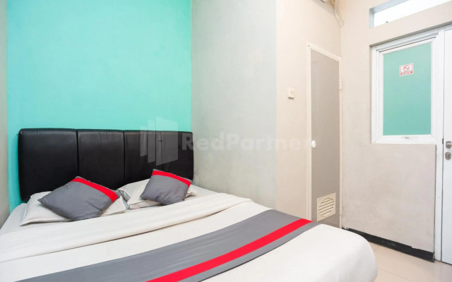 Super OYO 2223 J&b Room Utan Kayu