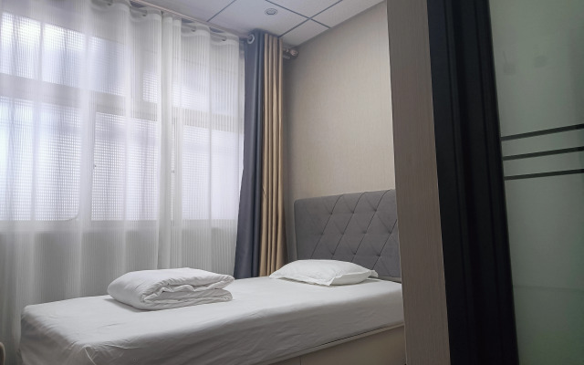 Dexin Express Hotel (Zhangqiu Harmony Plaza)