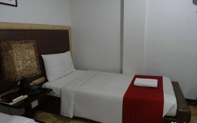 Ecoland Suites & Inn
