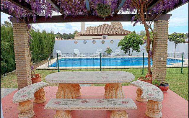 Bungalow Ramos III, con piscina compartida