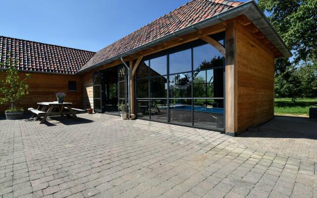 Spacious Holiday Home in Herveld with Pool