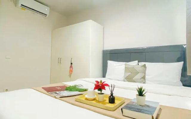 Simple 2Br At Azalea Suites Apartment