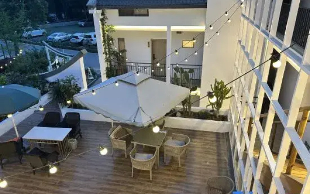 Shuying Courtyard Homestay (Sansheng Flower Valley Xingfu Meilin)