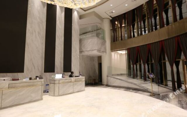 Jiuji Chain Hotel (Wenzhou Shuangyu Huanglong Branch)