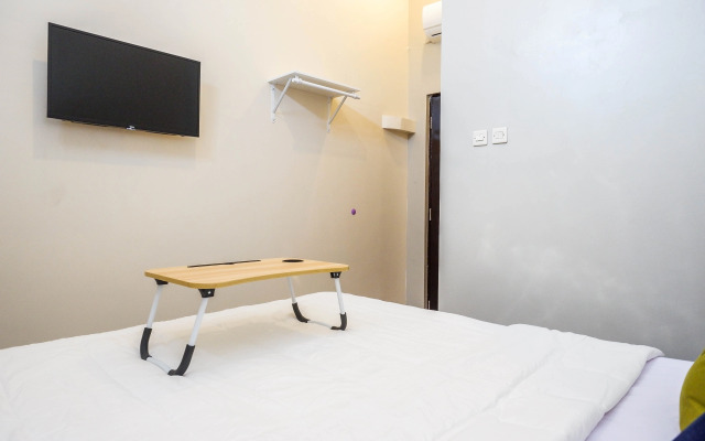 Urbanview Hotel John Sweet Home