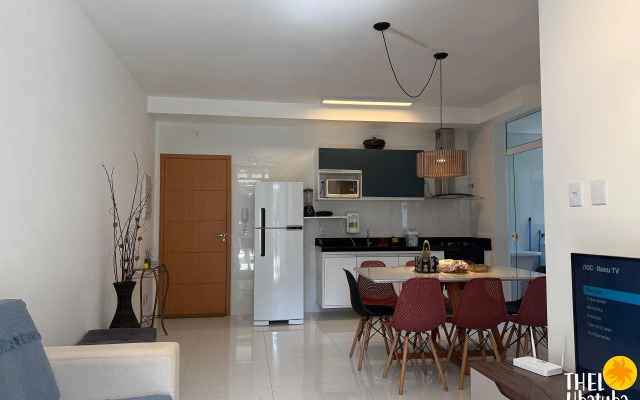 Apto completo e confortável com roupa de cama nas Toninhas  Condomínio Lumière