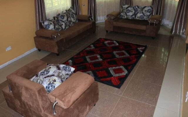 A & J Holiday Suites