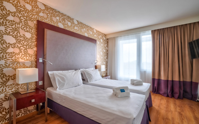 Отель Clarion Paris CDG Airport