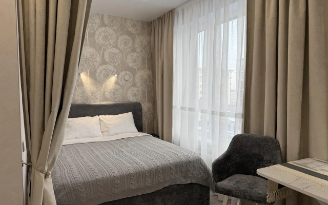 Уютная студия в пастельных тонах