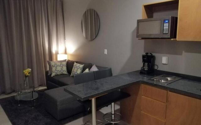 Modern 1 bedroom suite by beach Great location!