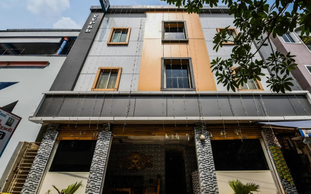 Varsha Grand Residence by OYO Rooms